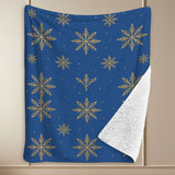 Navy printed blanket with gold Nordic snowflake motifs and plush sherpa backing, oversized 90×108 — rear view