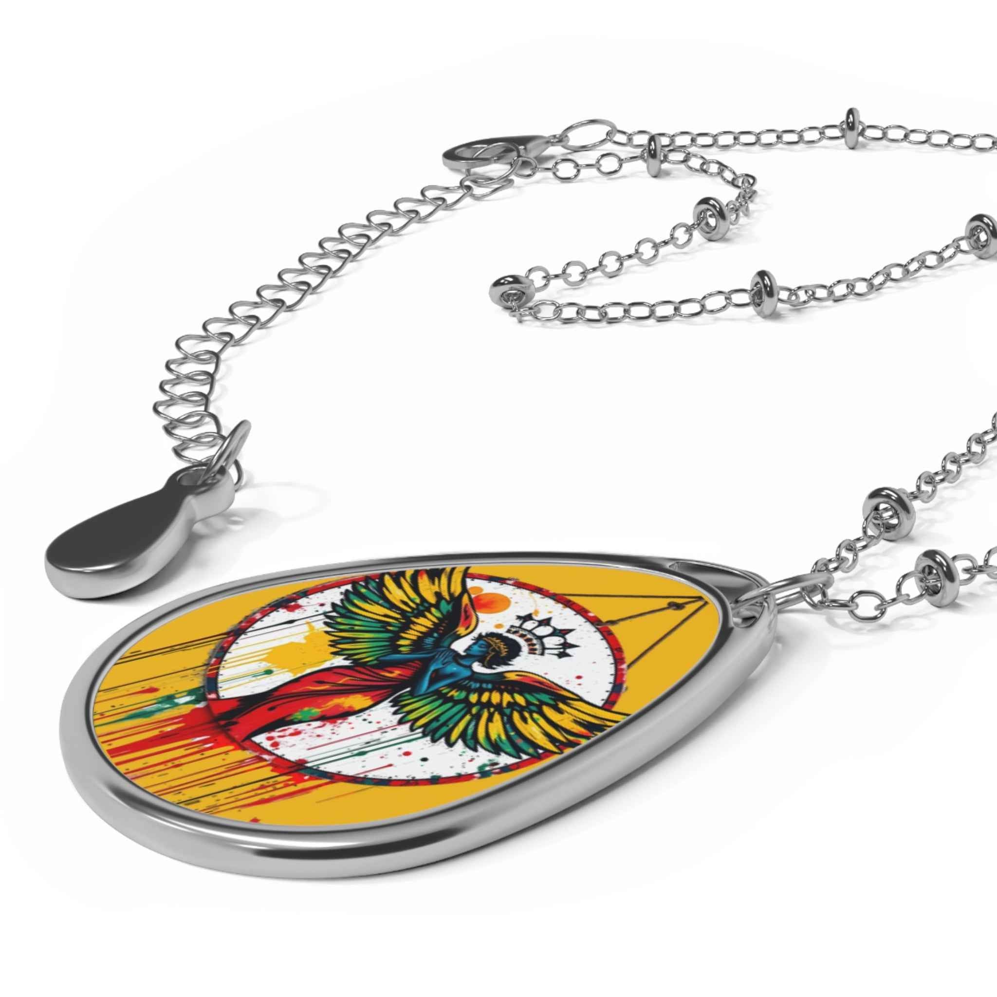 Mustard yellow ellipse pendant necklace showing a winged guardian motif with glossy finish and lobster clasp — side view