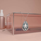 Oval necklace with a printed tiger face pendant in vibrant colors and a glossy silver-plated finish — additional view 7