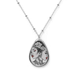 Glossy oval pendant necklace with colorful dual-portrait design on zinc alloy, lobster clasp — side view