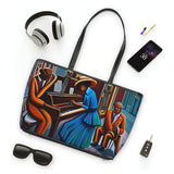 PU leather shoulder bag with gold-colored hardware, polyester lining, and double-sided prints — side view