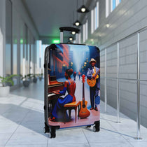 Hard-shell checked suitcase with blue caricature jazz print, telescopic handle, and four double 360° wheels