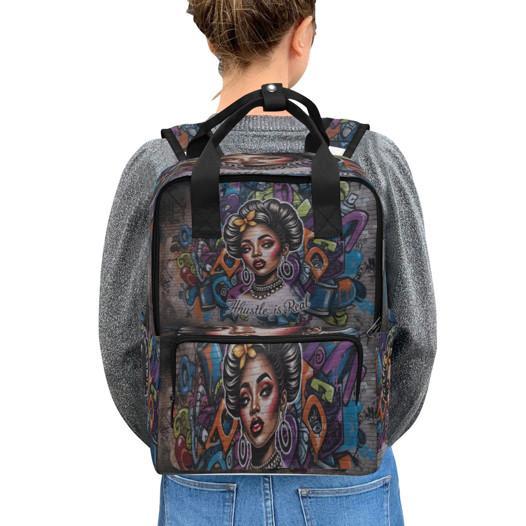 Rich and Rich The Hustle Is Real graffiti twin handle backpack in black with colorful street art design