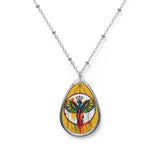 Mustard yellow ellipse pendant necklace showing a winged guardian motif with glossy finish and lobster clasp — alternate view