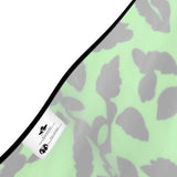 Green halterneck midi dress with backless design and abstract print — rear view