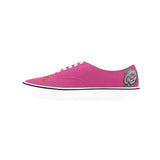 Pink low-top canvas sneakers with rose print, foamed insole and raw rubber sole — rear view