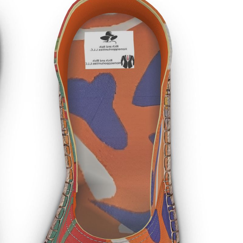 Rich and Rich Orange Abstract Unisex Espadrilles with vibrant orange abstract design on a white background