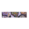 Purple abstract patterned women's scarf wrap or shawl draped elegantly