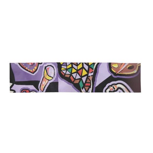 Purple abstract patterned women's scarf wrap or shawl draped elegantly