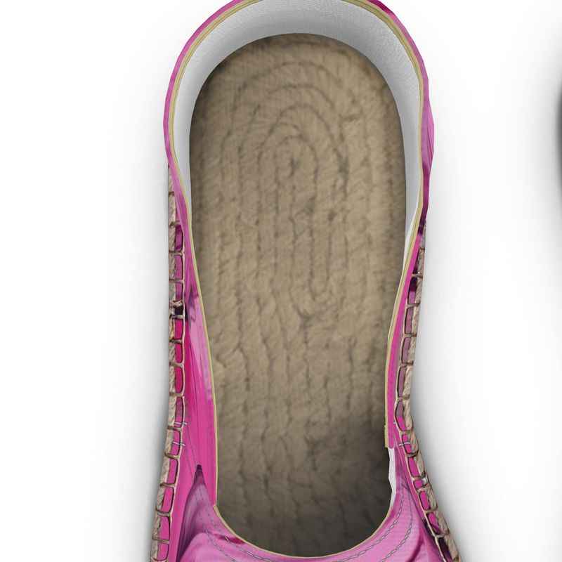 Pink unisex espadrilles with 'Her Eyes' print, jute insole and non-slip rubber sole — rear view