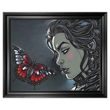 Framed canvas print of black butterfly and caricature figure in swept frame — alternate view