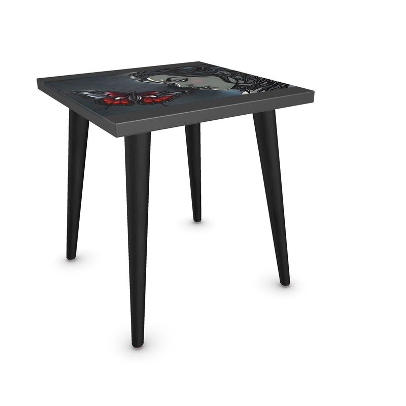 Small side table with artistic butterfly and caricature surface design and slender legs — product detail
