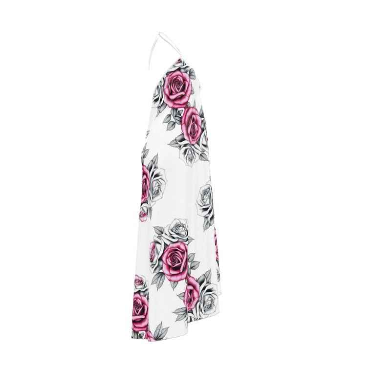 Pink halterneck backless dress with rose print and flowing silk-like fabric — rear view