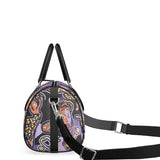 Small purple abstract duffle bag with black leather handles, faux suede lining and double zipper — side view