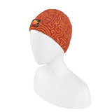 Double-layered orange abstract beanie with reversible turn-up trim, made from recycled poly jersey — side view
