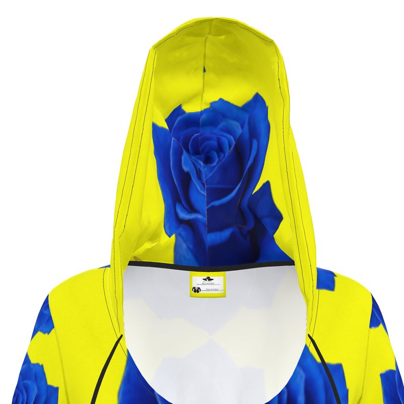 Woman wearing cozy jersey knit hoodie dress with kangaroo pocket and hood