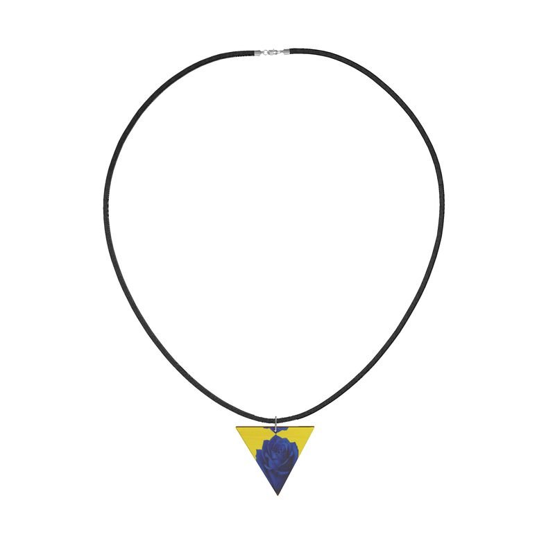 Geometric wooden pendant in yellow and rose on a black faux suede cord with sterling silver clasp