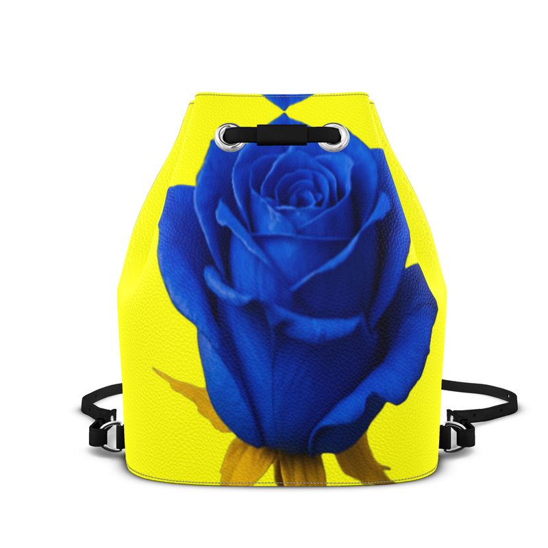 Nappa leather drawstring backpack in yellow and rose with adjustable leather straps and magnetic closure