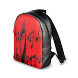 Red Nappa leather backpack with musical notes design and adjustable shoulder straps — side view