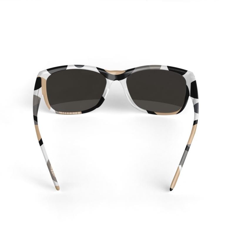 Round unisex sunglasses with earthtone circular dimension print and slim arms — product detail