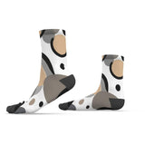 Pair of crew socks with circular dimension print, ribbed cuff and arch support, unisex — side view