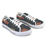 Blue floral low-top women's canvas sneaker with mesh and EVA insole and rubber outsole — side view