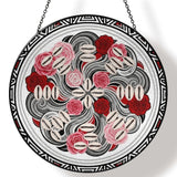 Rose floral glass suncatcher with tribal-inspired artwork and included metal hanging chain — side view