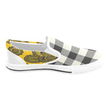 Men's yellow canvas slip-on shoe with abstract and checkerboard print — side view