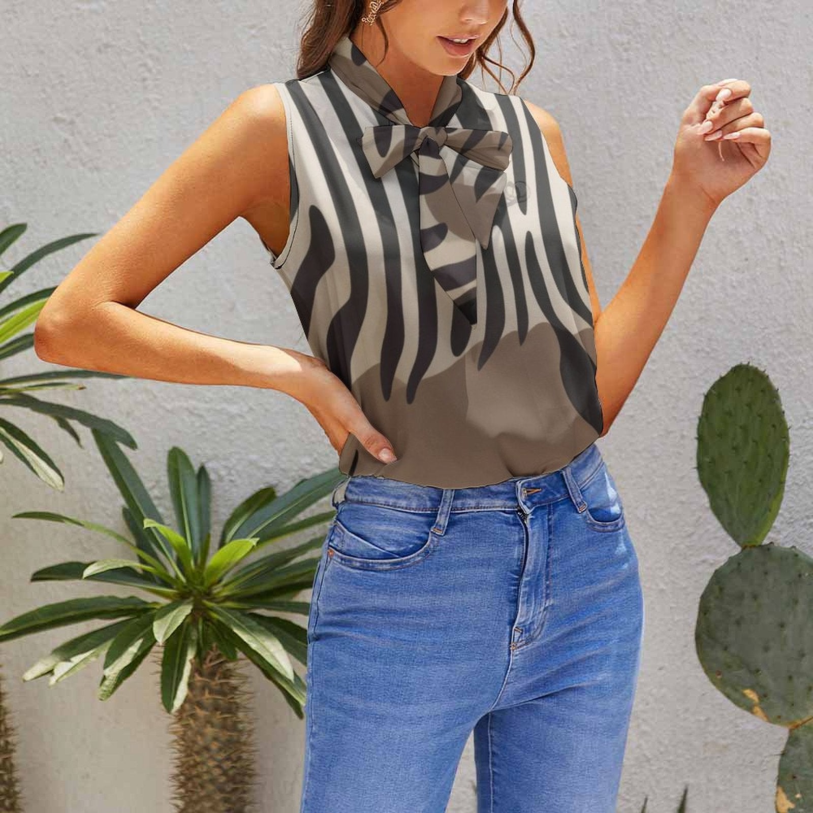 Women’s sleeveless tie neck top in soft polyester blend, styled for casual summer wear