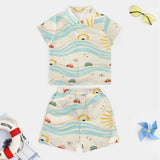 Bright yellow boys' short-sleeve button-up shirt with matching shorts in smooth peach-skin velvet — product detail