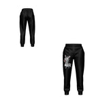 a Critter Kicks Zebra Zest Boy's Black Sweatpants