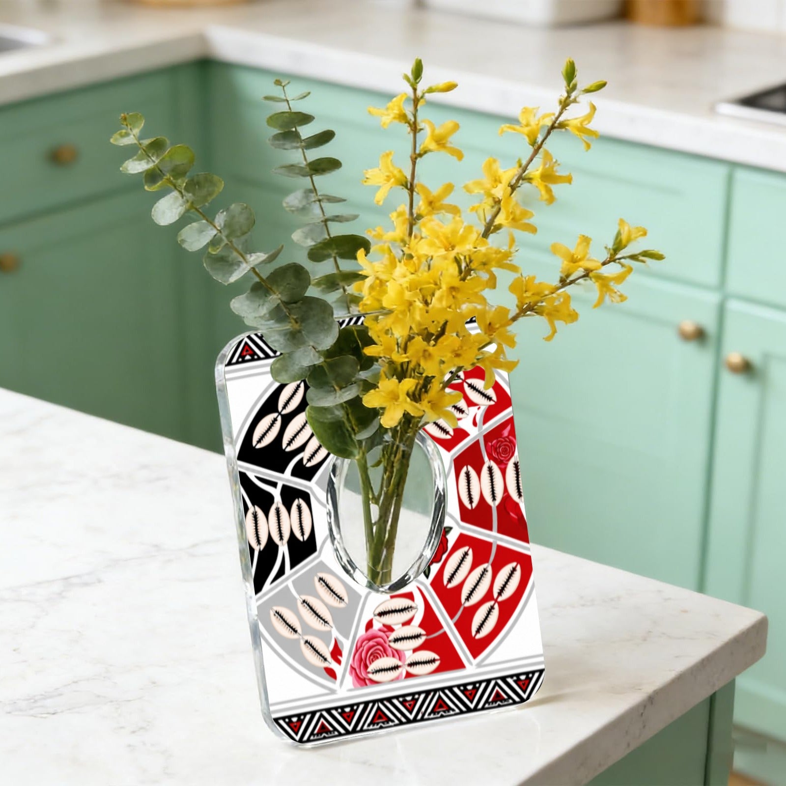 Acrylic photo frame vase with tribal artwork, recessed flower compartment, and cowrie shell accents — side view