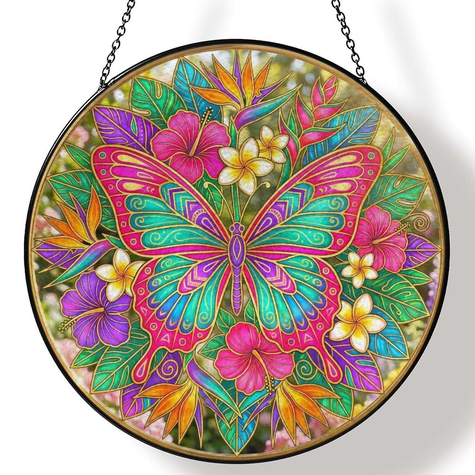 Large butterfly glass suncatcher with gold-lined wings amid pink, teal, and purple floral burst with hanging chai — rear view