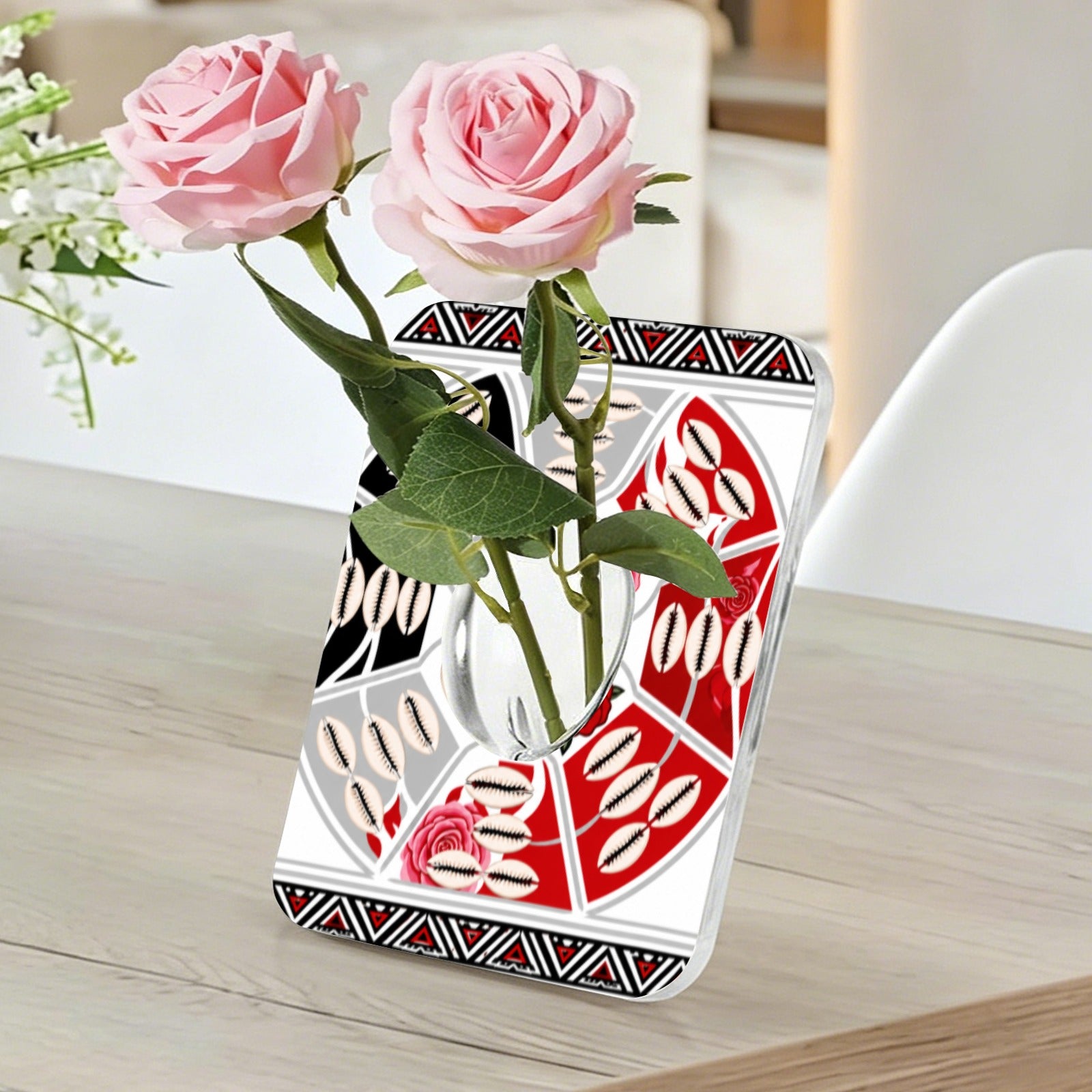 Acrylic photo frame vase with tribal artwork, recessed flower compartment, and cowrie shell accents — rear view