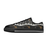 Men’s navy black canvas low-top sneakers with piano and saxophone-inspired artwork and metal eyelets — side view