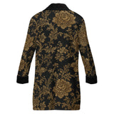 Black men's double-breasted coat with gold floral brocade pattern and sherpa lining — side view