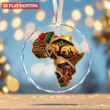 Round crystal glass ornament depicting the African continent with red ribbon and gift box — additional view 7