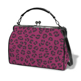 Magenta animal-print kisslock crossbody bag in waxed PU with top handle — alternate view