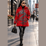 Red hooded women's puffer coat with Feng Shui dragon artwork, detachable hood, and zipper