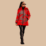 Red hooded women's puffer coat with Feng Shui dragon artwork, detachable hood, and zipper — rear view