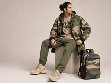 Load image into Gallery viewer, Rich and Rich Camo Green Unisex Sports Travel Backpack | Durable 1200D Nylon Backpack for School, Gym &amp; Daily Travel - Rich and Rich Homeopportunities

