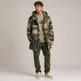 Camo green mid-length men's hooded coat with fleece lining and zip closure