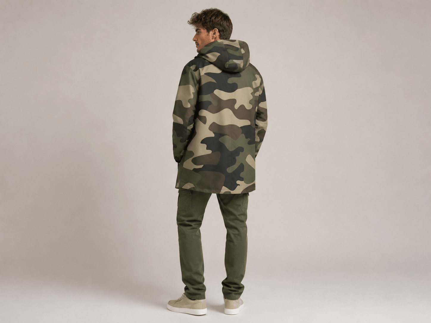 Camo green mid-length men's hooded coat with fleece lining and zip closure — side view
