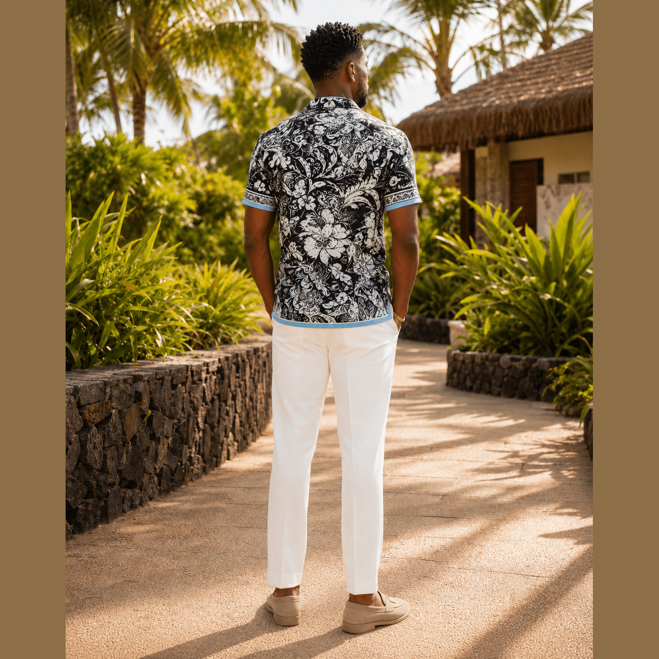 Back detail of continuous leaf pattern on tropical print shirt