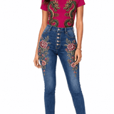 Fuchsia tee with gold and emerald twin dragon graphic paired with denim embroidered with floral and scale — additional view 6