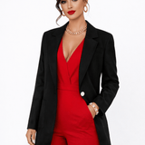 Black women's blazer in polyester with flat lapel, long sleeves and two pockets in a regular fit
