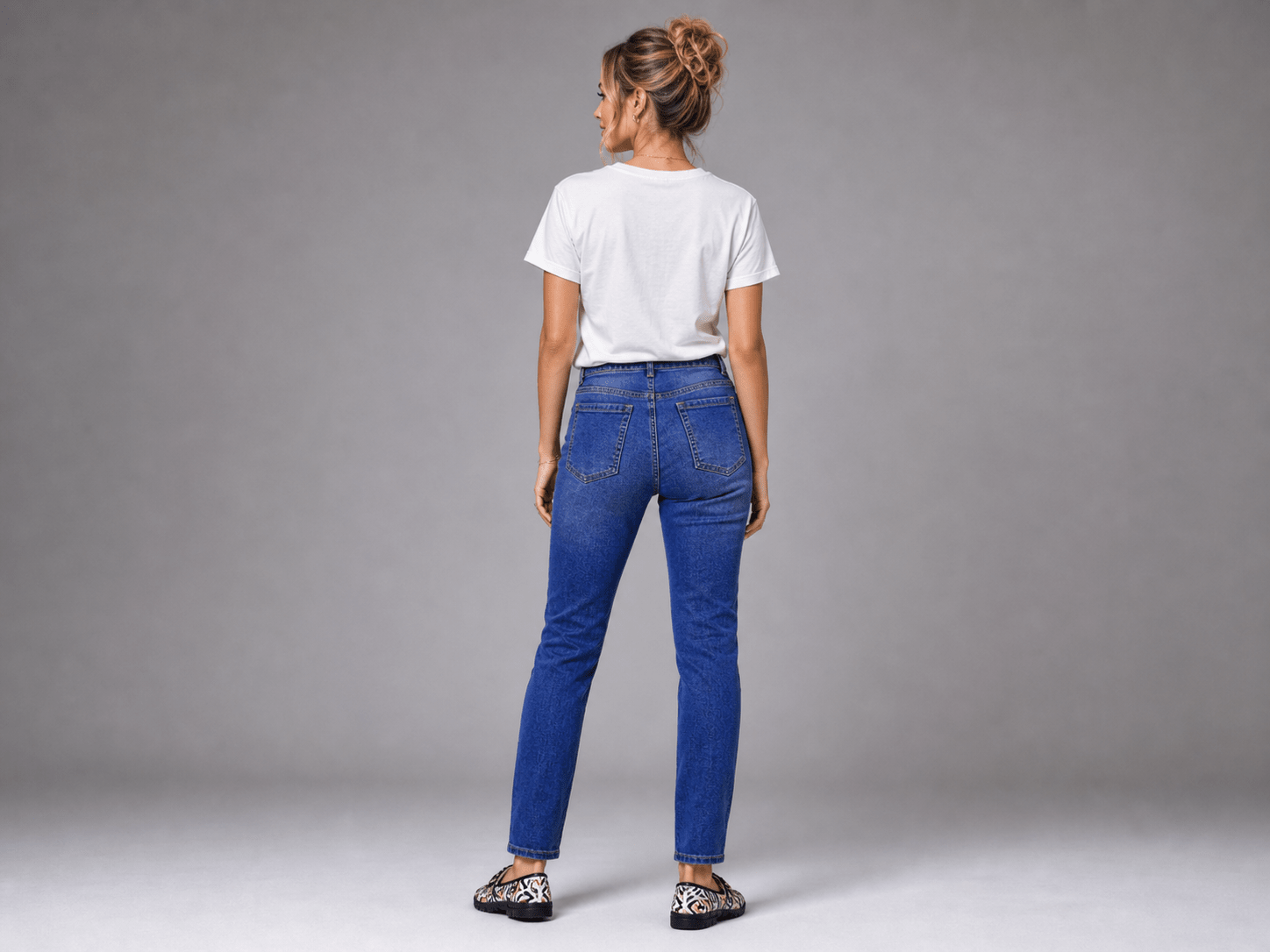 Women's high-waist black and gold button-front jeans with five-button closure and four pockets — additional view 6