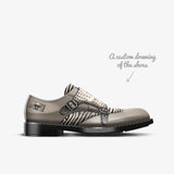 Beige men's monk strap dress shoes in leather and suede with double buckle and rubber sole — rear view