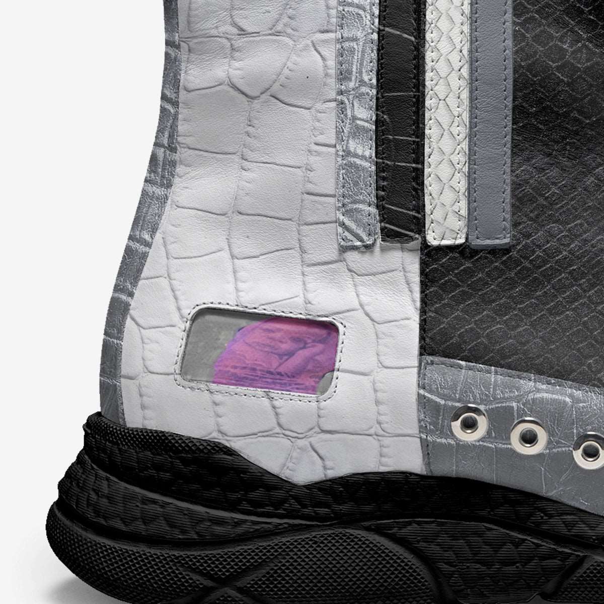 Gray and black retro high-top sneaker with leather upper, elasticated sides and pull tab — side view