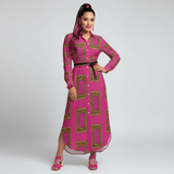 Pink long-sleeve button-up shirtdress with a split hem and relaxed long-shirt silhouette